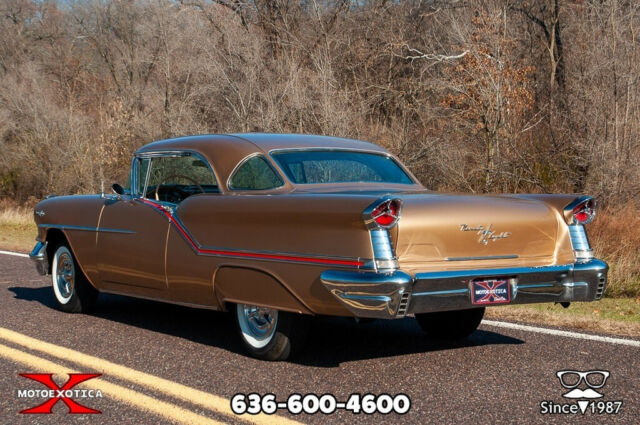 Oldsmobile Starfire 98 Holiday 1957 image number 30