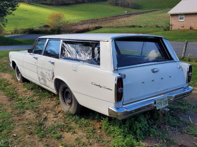 Ford Country Squire 1966 image number 28