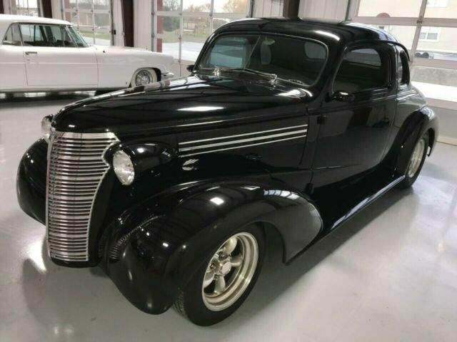 Chevrolet FIVE WINDOW COUPE ALL STEEL 1938 image number 13