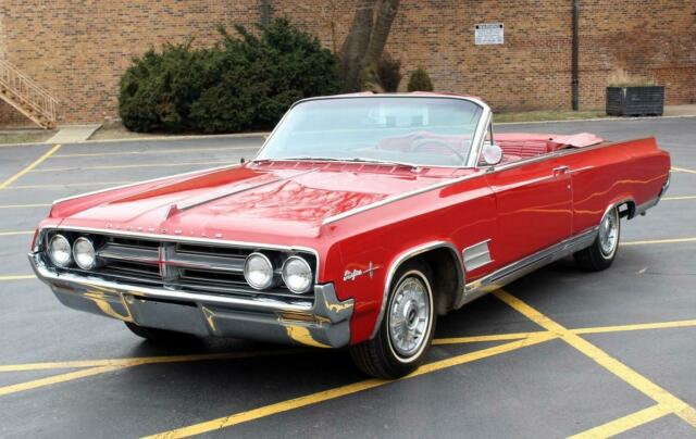 Oldsmobile Starfire 1964 image number 12